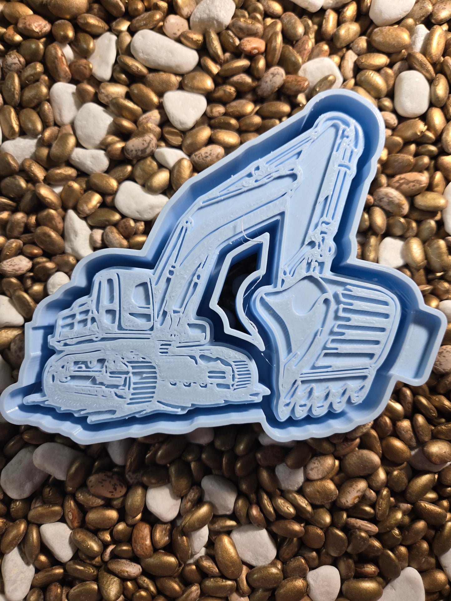 Backhoe mold